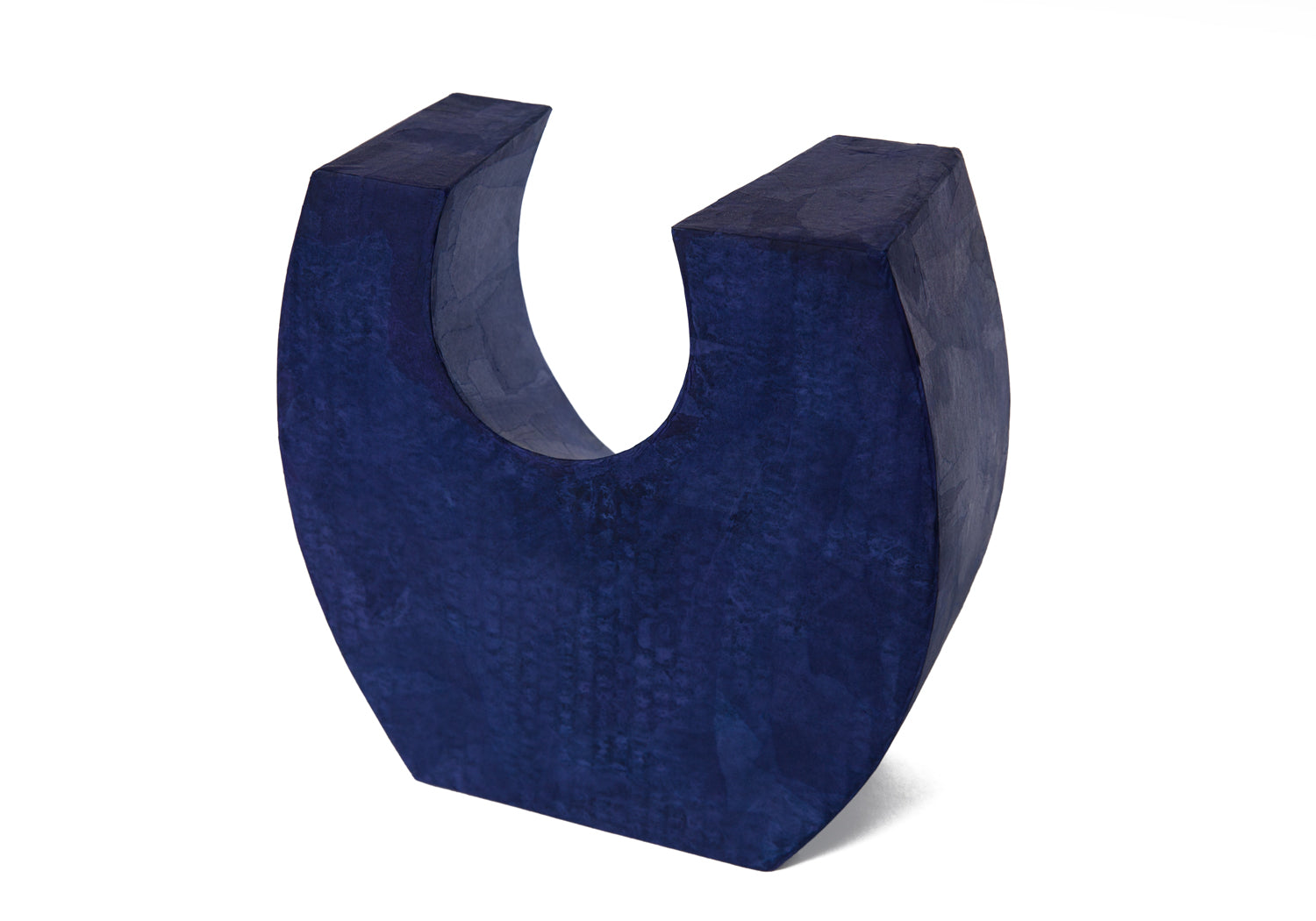 Picture of a beautiful purple horseshoe shaped biodegradable paper cremation urn on sale at Muses Design Urns. Left side view.