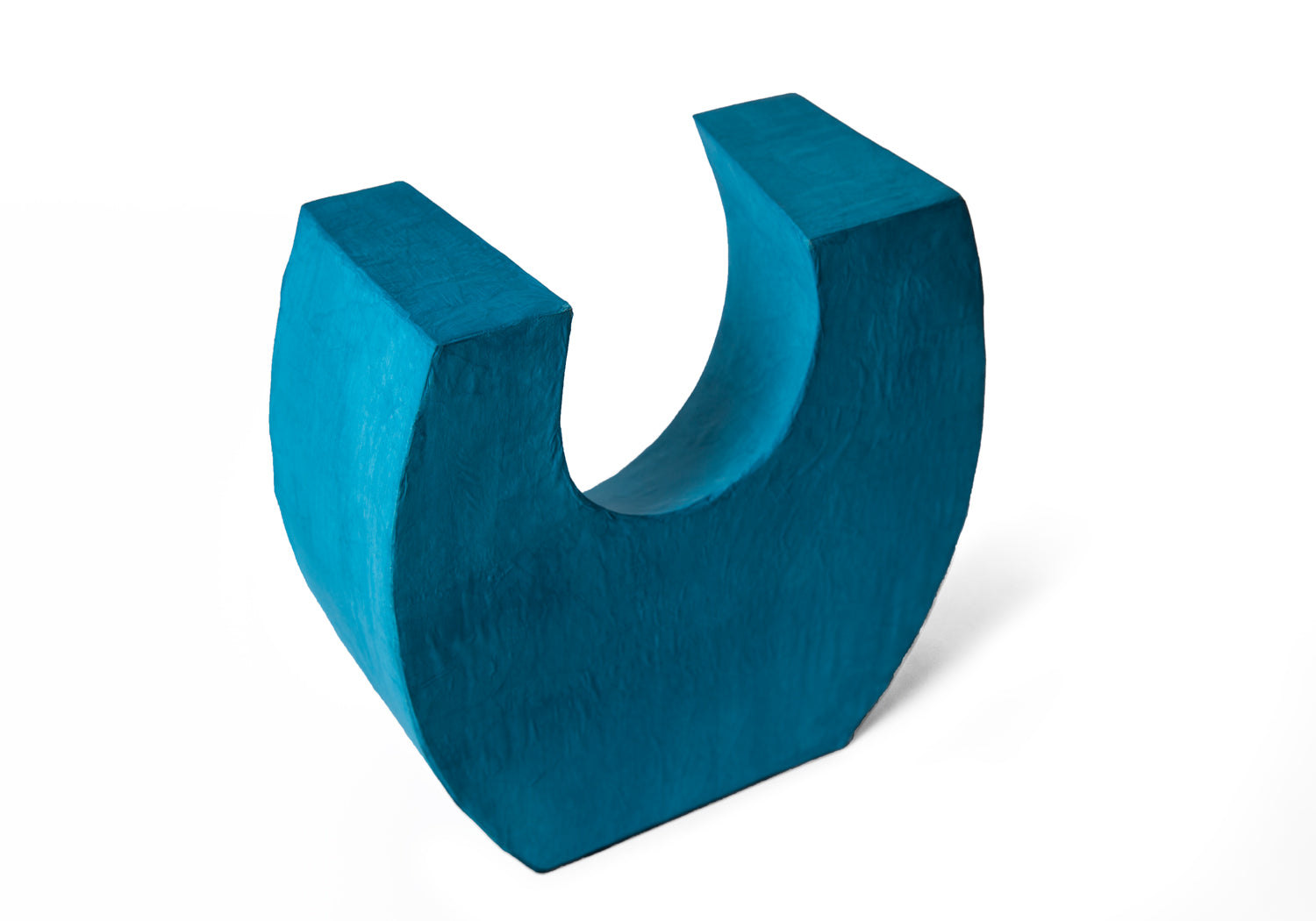 Picture of a beautiful aqua horseshoe shaped biodegradable paper cremation urn on sale at Muses Design Urns. Back view.