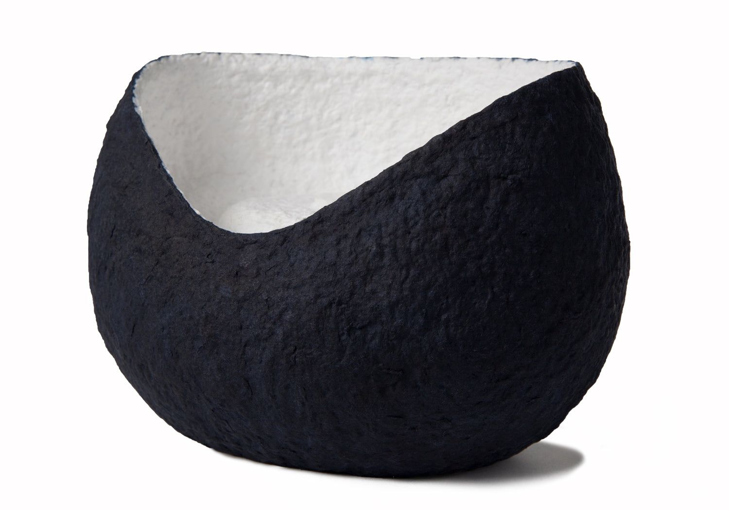 Picture of a white and blue ovoid shaped biodegradable cremation urn for dogs on sale at Muses Design Urns. Right side view.