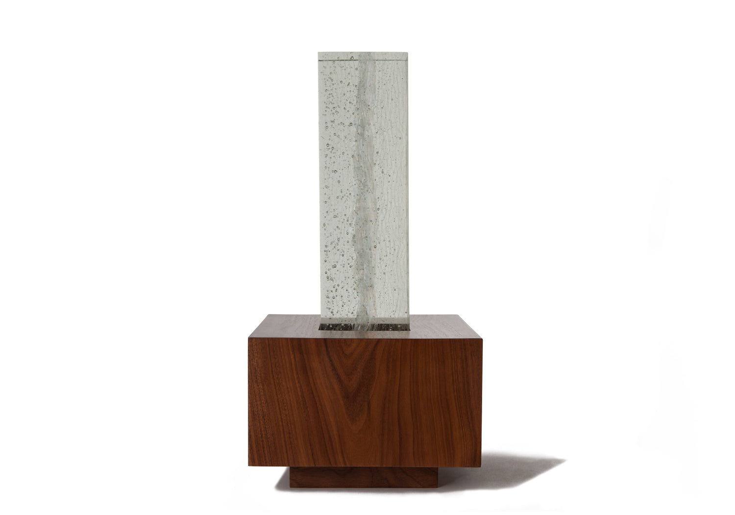 Picture of a beautiful glass and walnut wood cremation urn on sale at Muses Design Urns. Front view.