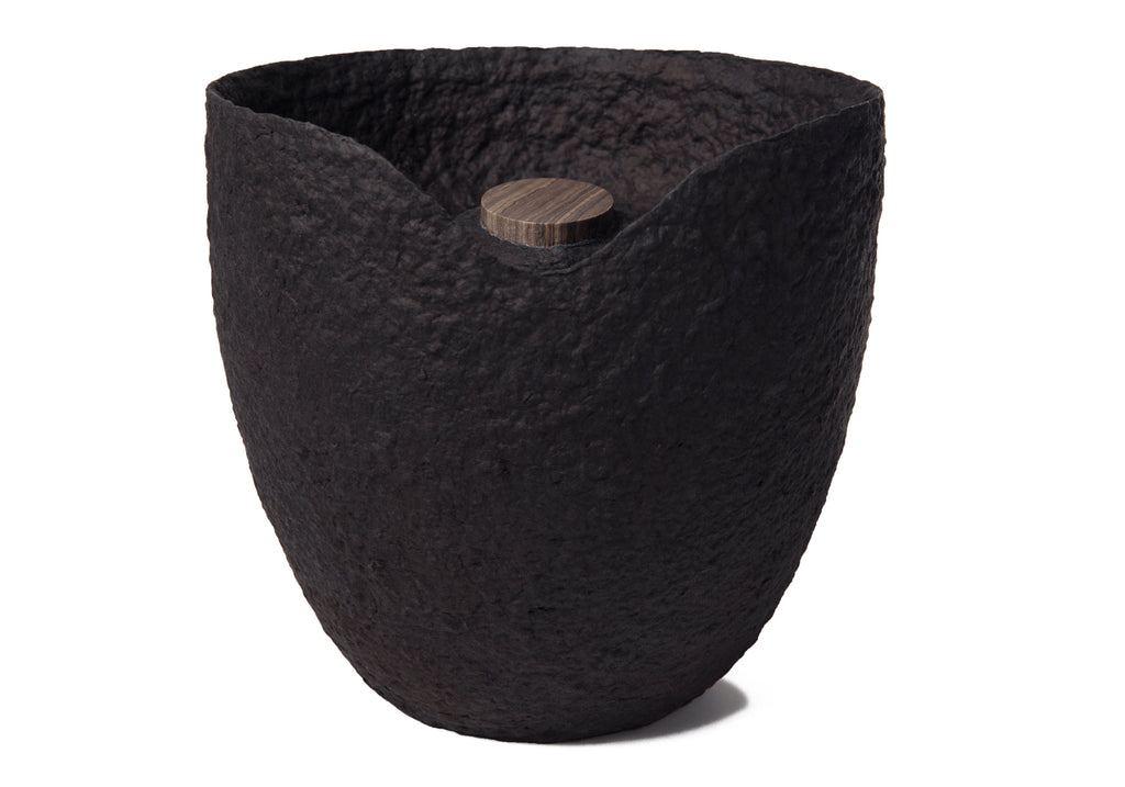 Picture of a black ovoid biodegradable cremation urn on sale at Muses Design Urns. Front view.