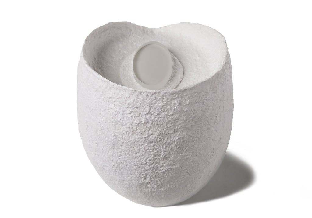 Picture of an ovoid biodegradable cremation urn made of white cotton fibre on sale at Muses Design Urns. Back view.