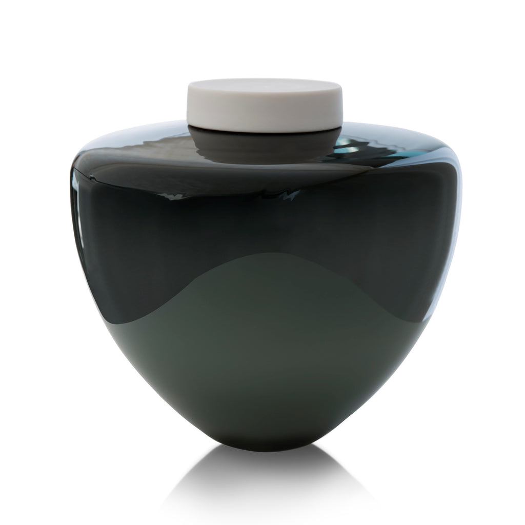 Picture of a deep grey blown glass cremation urn for adult on sale at Muses Design Urns. Front view. Glossy finish.