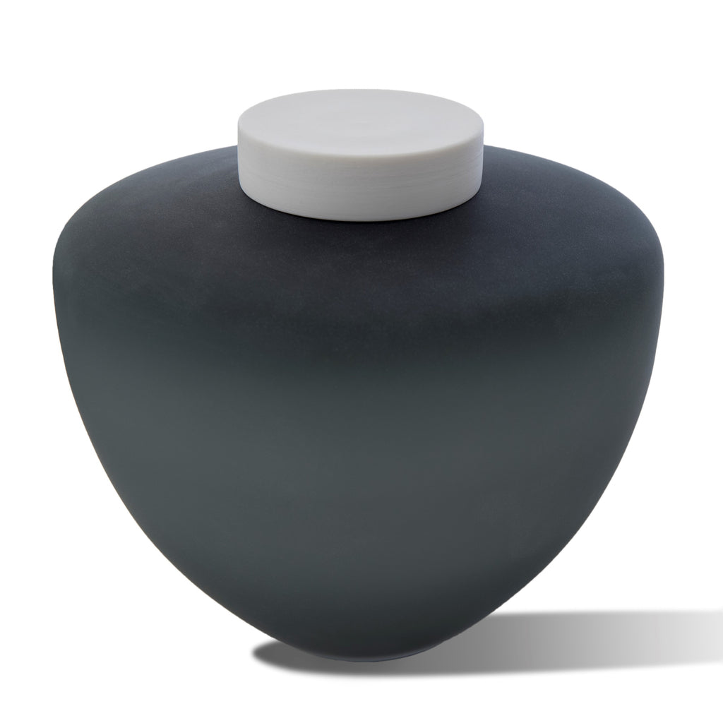 Picture of a deep grey blown glass cremation urn for adult on sale at Muses Design Urns. Front view. frosted finish.
