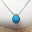 Picture of a Stainless Steel  cremation jewelry with a small-drop pendant for ashes